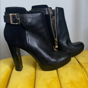MICHAEL Michael Kors Black Heeled Boots with Gold Accents